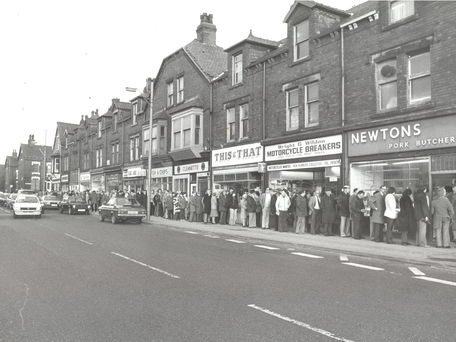 This queue stretched for more than 100 yards down Kirkstall Road. Shoppers were waiting patiently outside Newton's pork butchers shop to pick up their Christmas orders