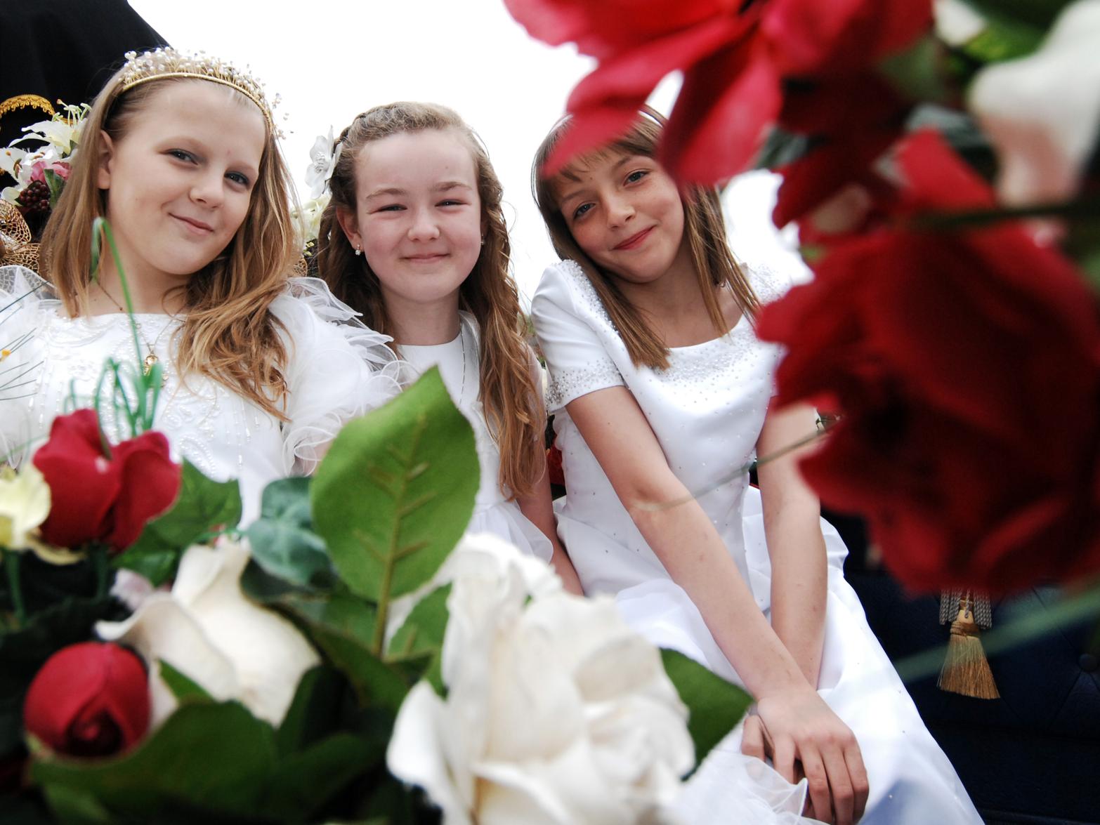 Halton Moor May Queen Serena Sissons (left) with her attendants Niamh Ryan (centre) and Kerry Chappelow, outside Halton Moor WMC.
