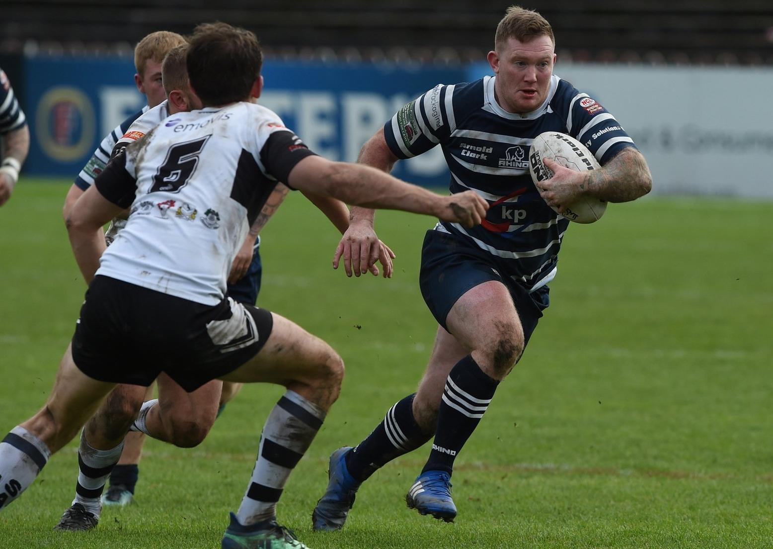 Lions' Scott Glassell on the charge. PIC: © RFL/Matthew Merrick Photography