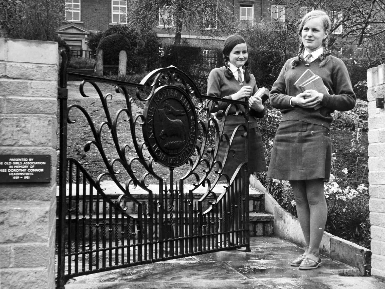 Fulneck Girls' School pupils Christine Rutley, (left) and Diane Gregson at the memorial gate to Miss Dorothy Connor in the school gardens.