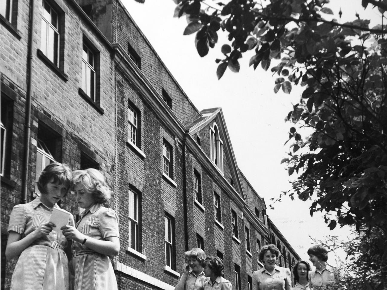 Pupils relax on the broad terrace before the handsome Georgian frontage of Fulneck School.