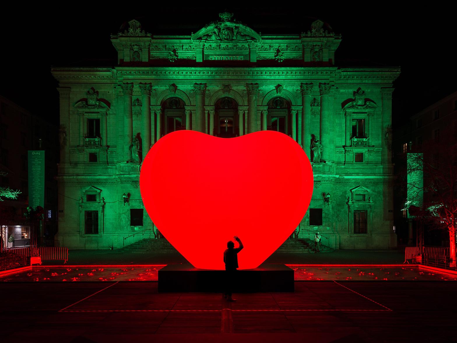 With Love. A bright red heart will be landing on the front of the Town Hall. Its purpose: to take the pulse of the city and its  lovers. Have your collective beats per minute measured and turned into a song
