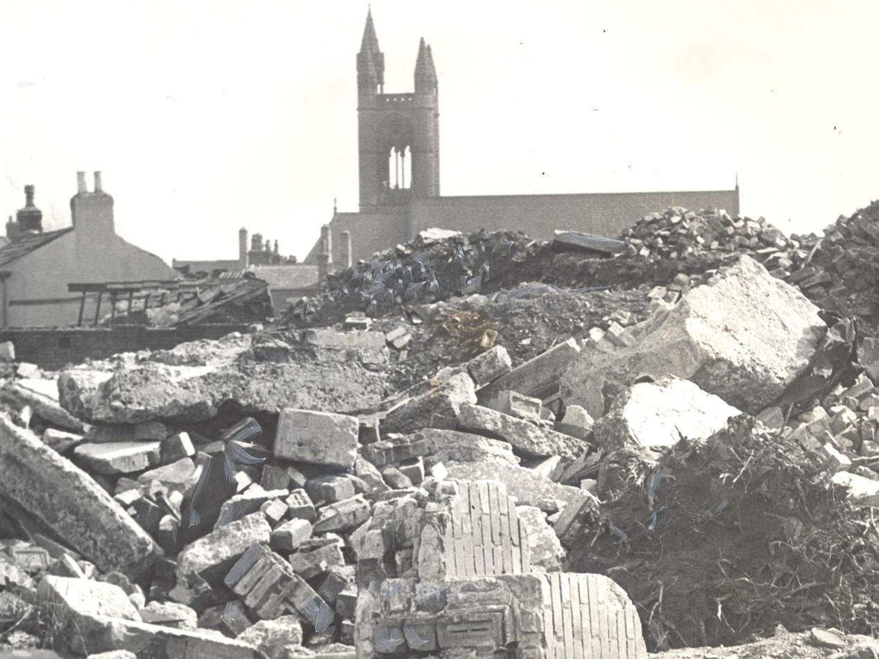 A view - from Buslingthorpe Lane - of St. Clement's Church at Sheepscar with debris from the Leeds Inner Ring Road workings in the foreground.