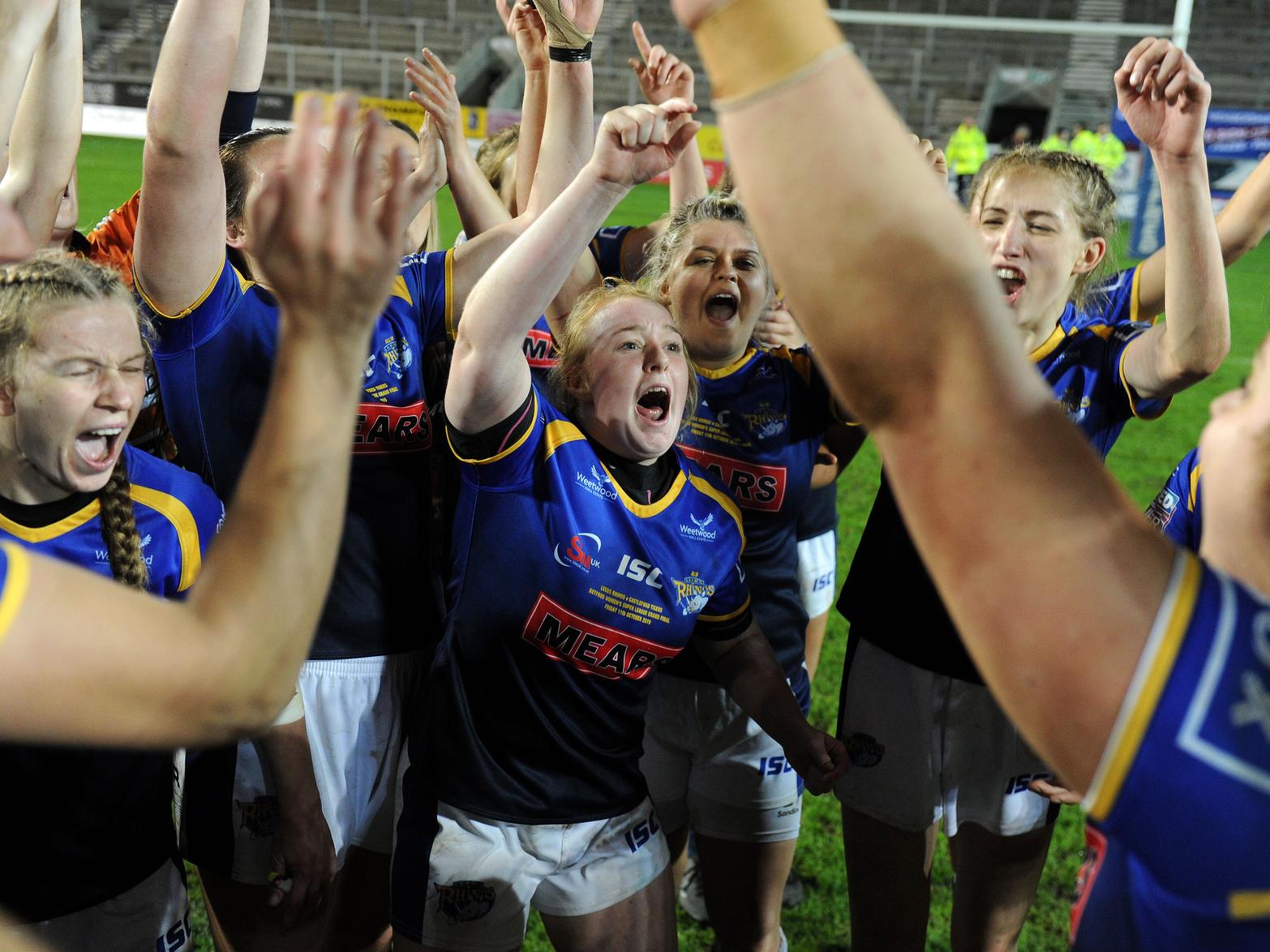 Leeds Rhinos players celebrate after their Grand Final victory over Castleford Tigers.