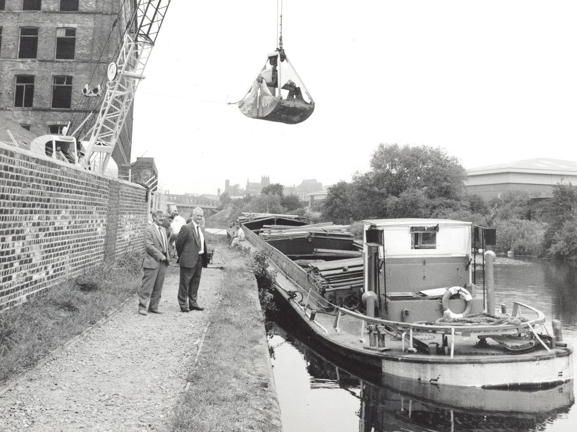 One of the first barges to arrive at the wharfe on Goodman Street, Hunslet, pictured here during the off-loading of its cargo.