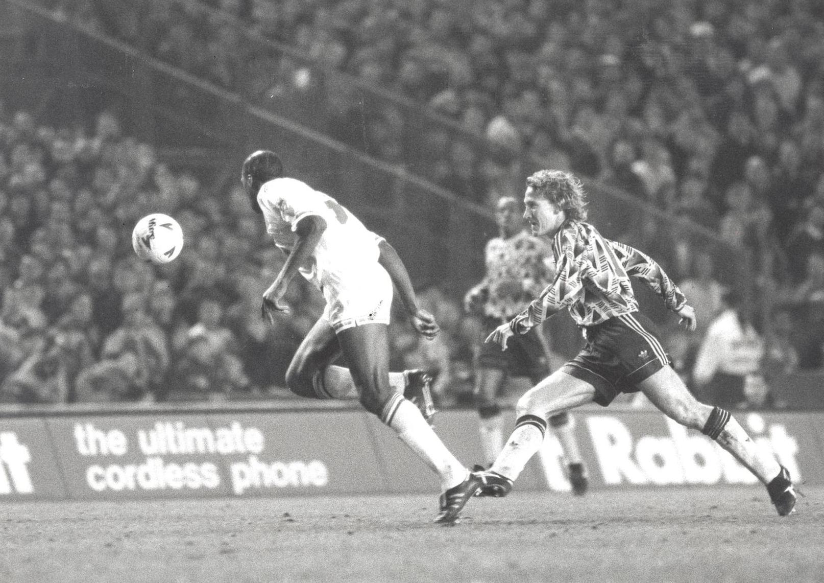 Chris Whyte beats Ray Parlour in a chase for the ball during the FA Cup fouerth ropund replay at Elland Road. Remember that free kick Macca scored that night?