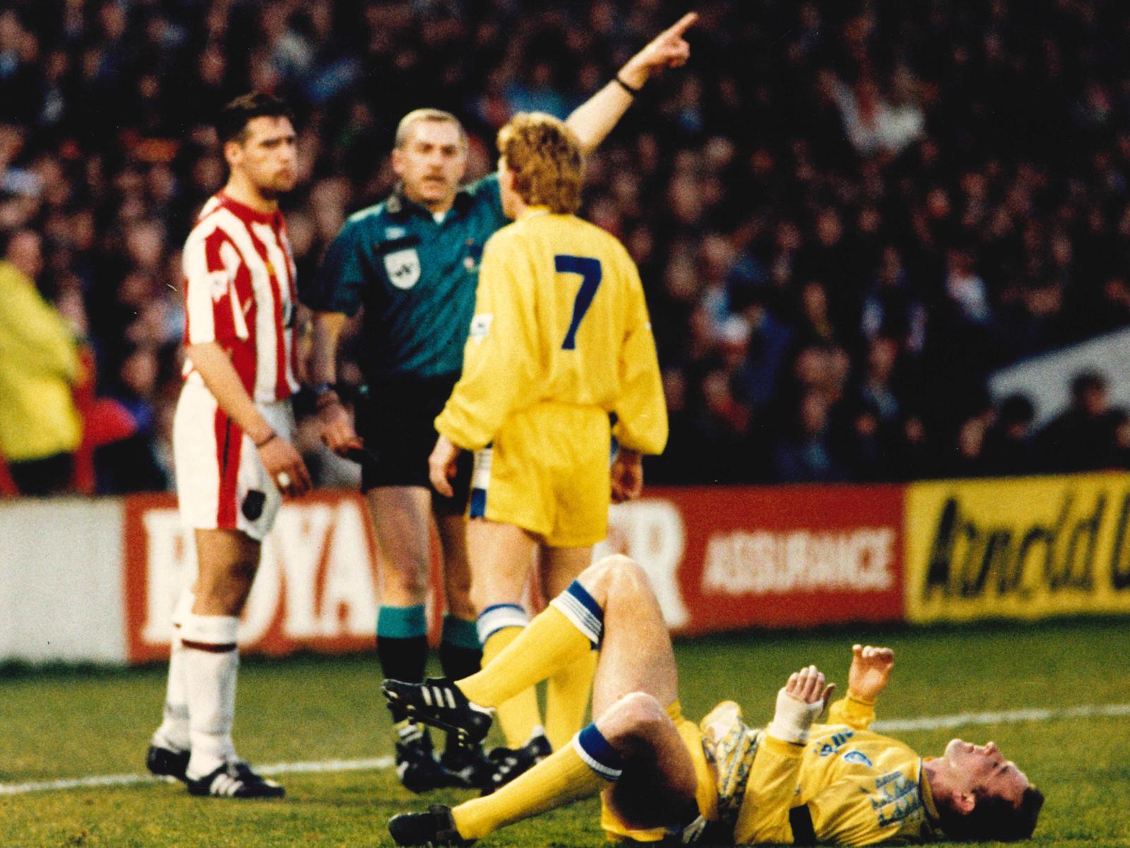 Ouch! Gordon Strachan remonstrates with the ref after seeing John Pemberton flatten Gary MacAllister.