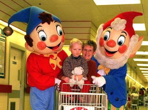 Popular children's characters Noddy and Big Ears visited Leeds to support Help the Aged as Tesco Charity of the Year 1998. Pictured at Tesco's, Roundhay Road, Leeds, with shopper Liz Holliday and son Max of Roundhay