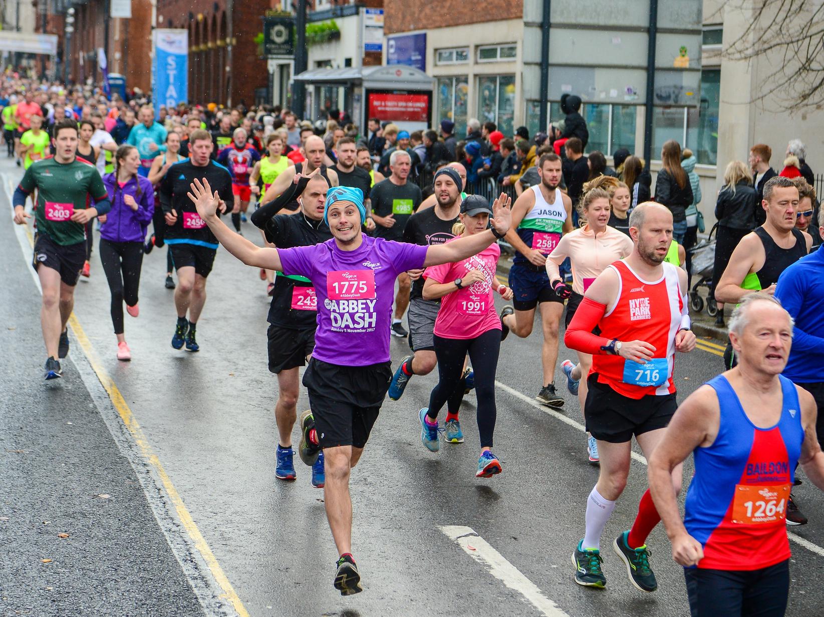 Runners set off on The Headrow.
