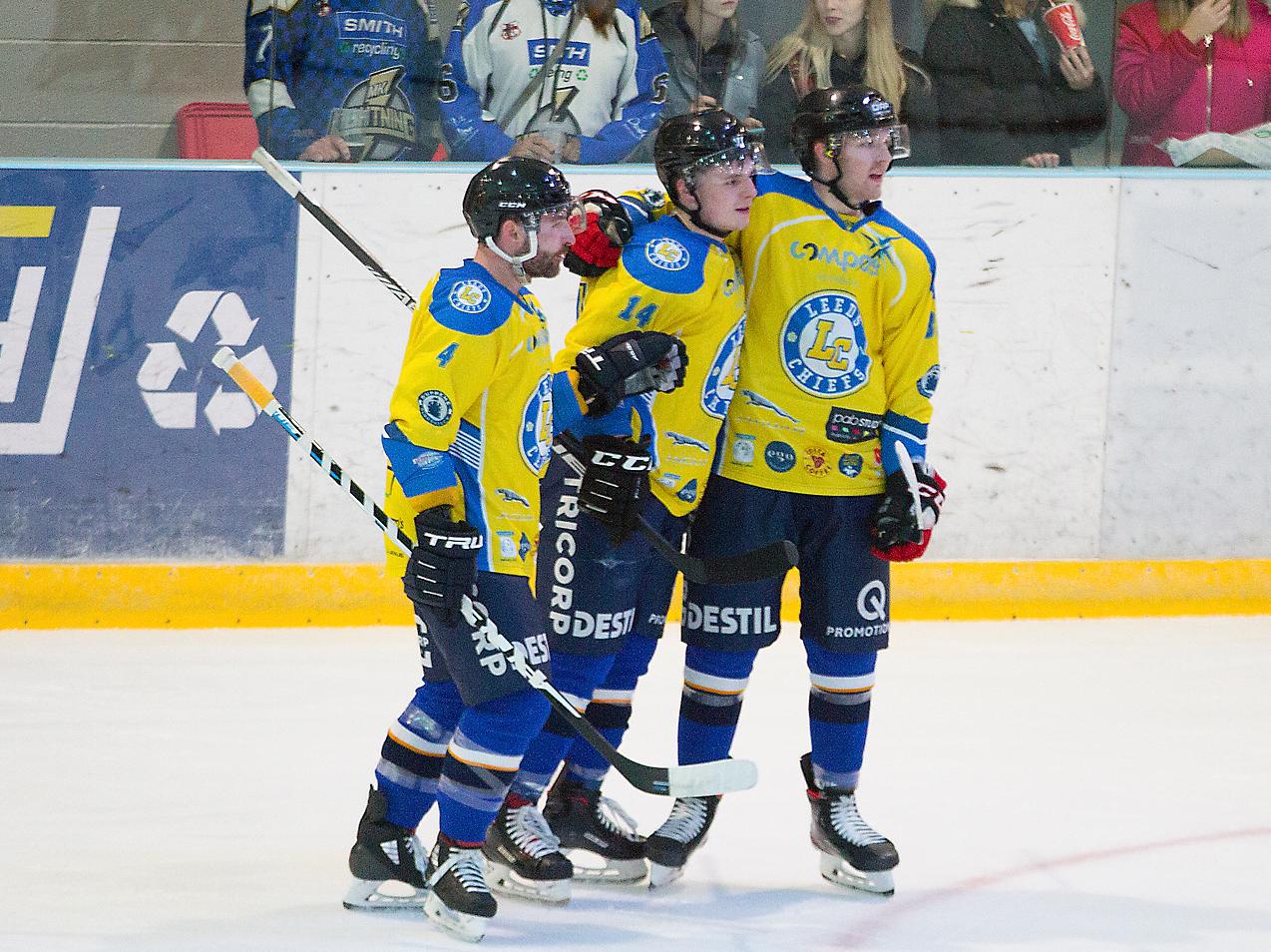DOUBLE TROUBLE: Adam Barnes, far right, celebrates one of his two goals at Milton Keynes last Sunday with player-coach Sam Zajac, left, and Lewis Baldwin. Picture courtesy of Tony Sargent.