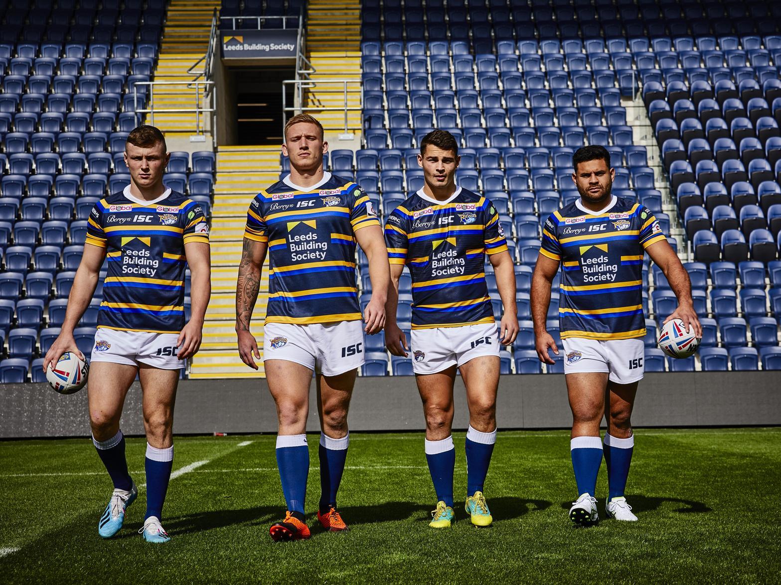 Harry Newman, Mikolaj Oledzki, Stevie Ward and Rhyse Martin show off the new Leeds Rhinos home shirt.