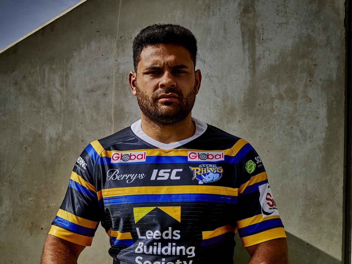 Rhyse Martin models Leeds Rhinos new home shirt.