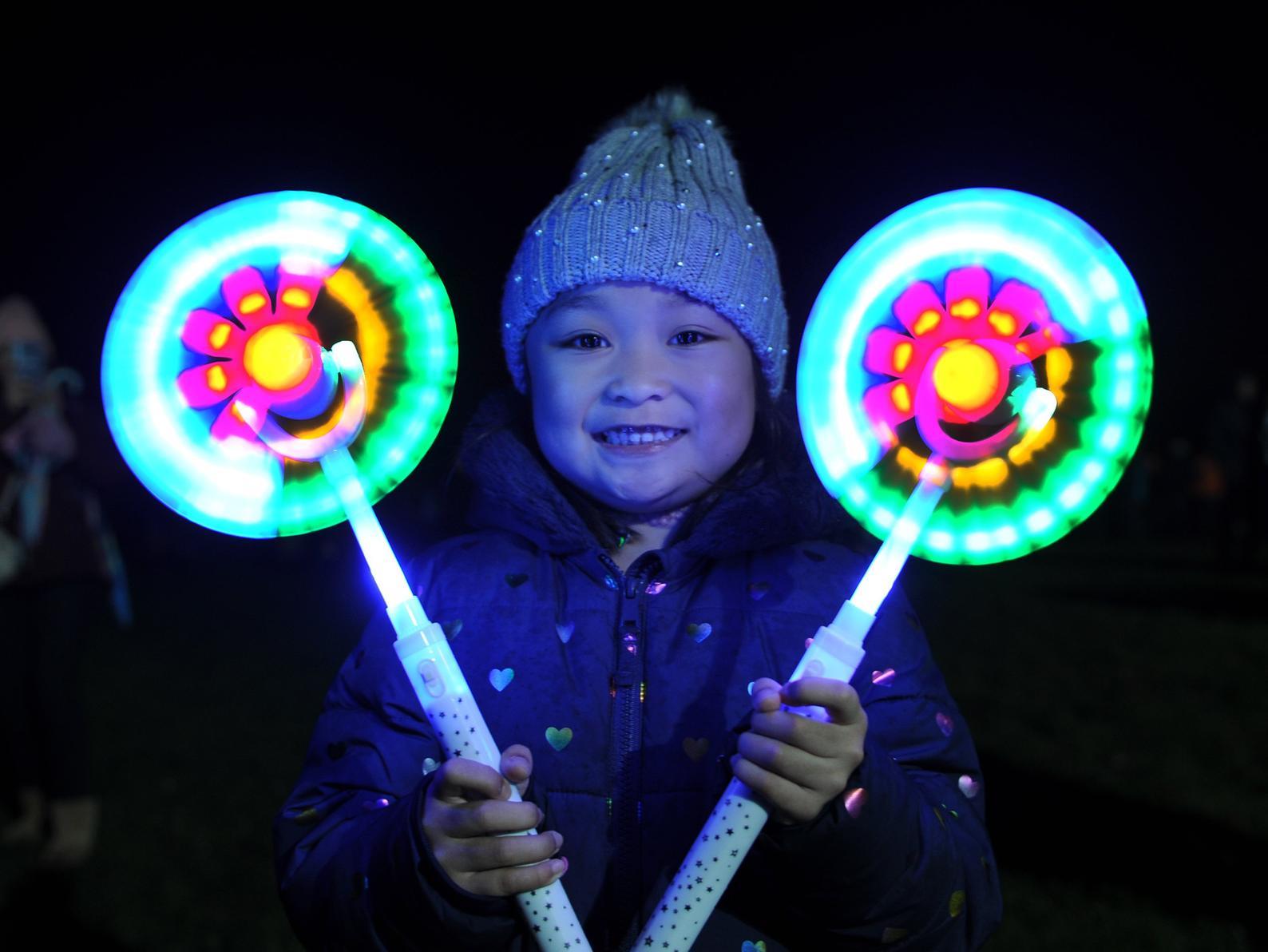 Seven-year-old Janelle Amor with her glow stick spinners.