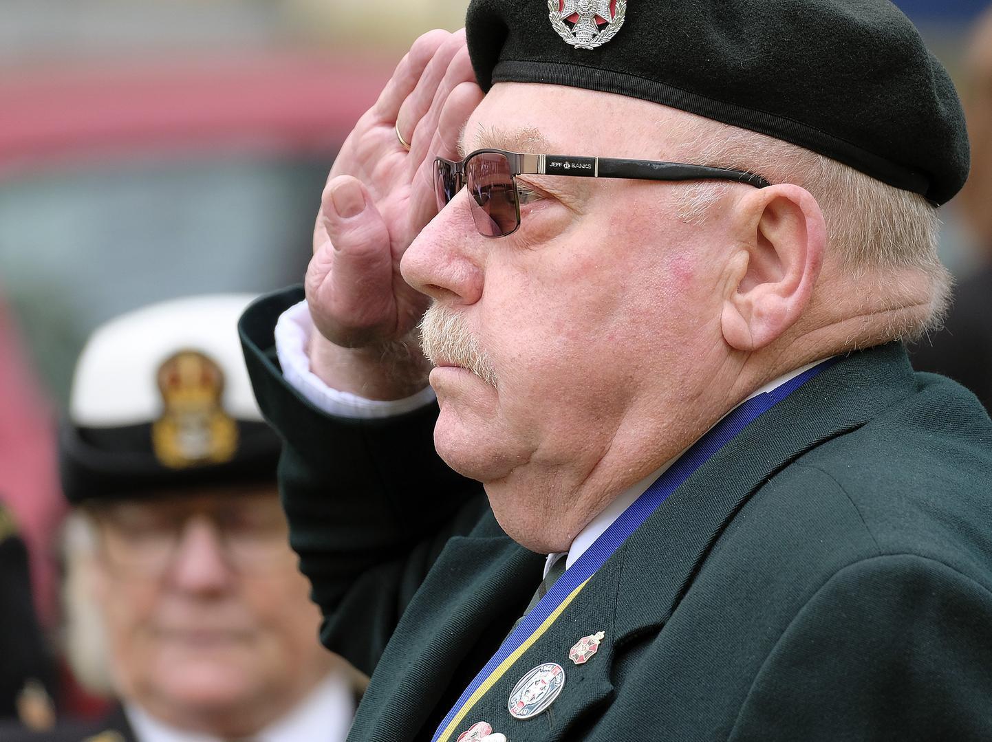 Veterans pay their respects.