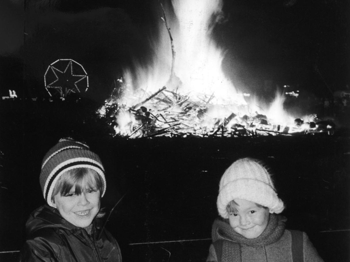 These youngsters let off their sparklers at the East End Park Community Association bonfire.