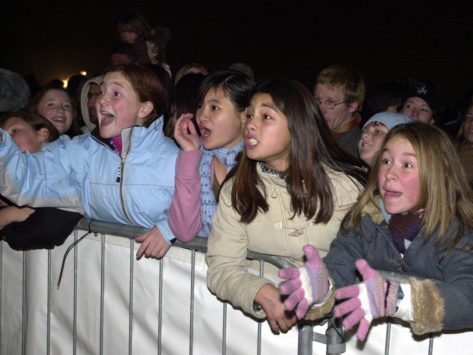 Youngsters watch the fireworks on Soldiers Field.