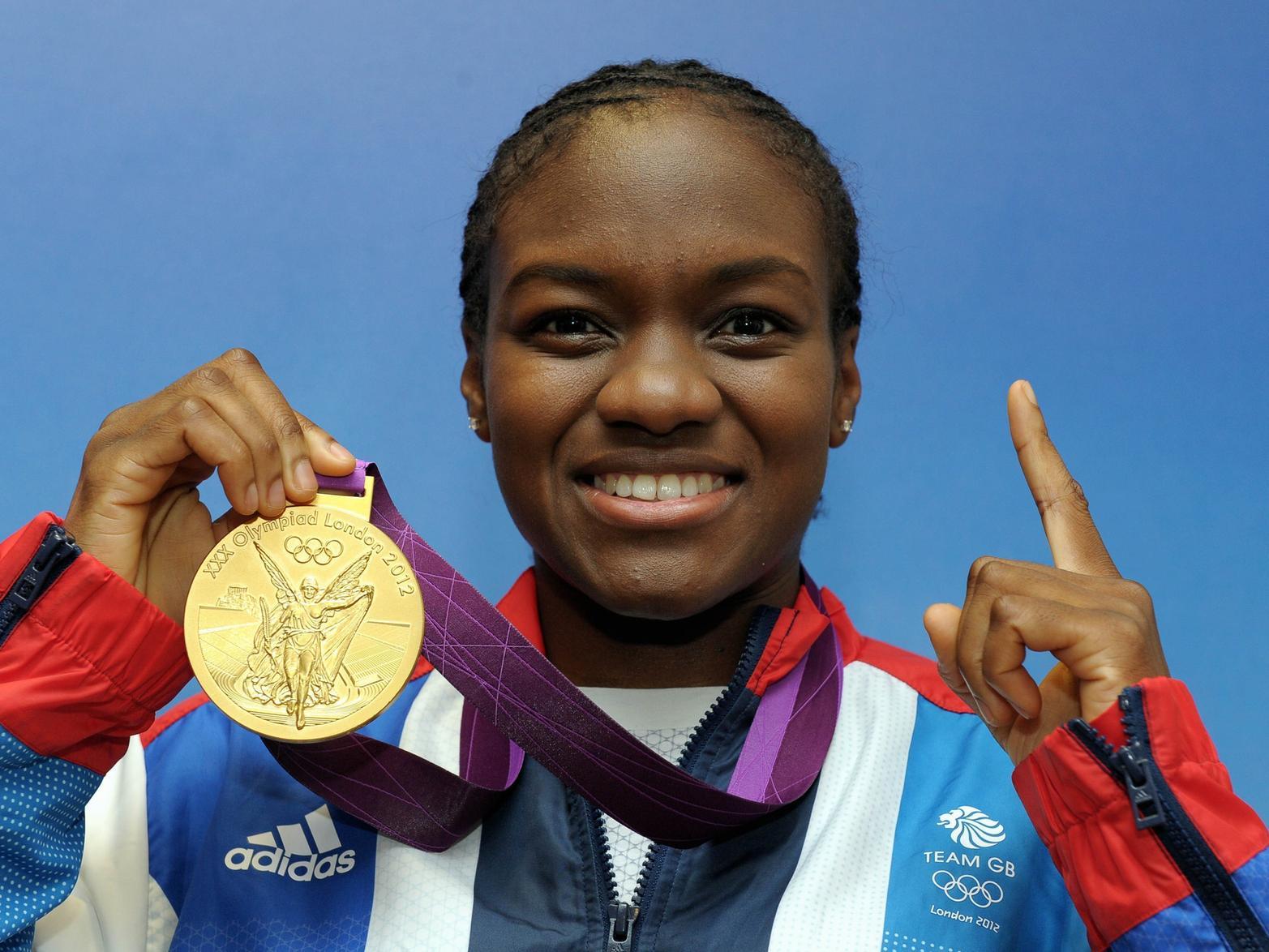 Nicola Adams celebrates gold at the London Olympics in 2012. PIC:PA