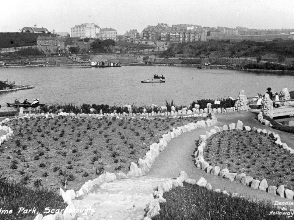 Here we see flower beds in the new park. To the right of the picture is a footbridge over Peasholm Beck which supplied the lake. The flowerbeds in the foreground were later altered to accommodate a wishing well.