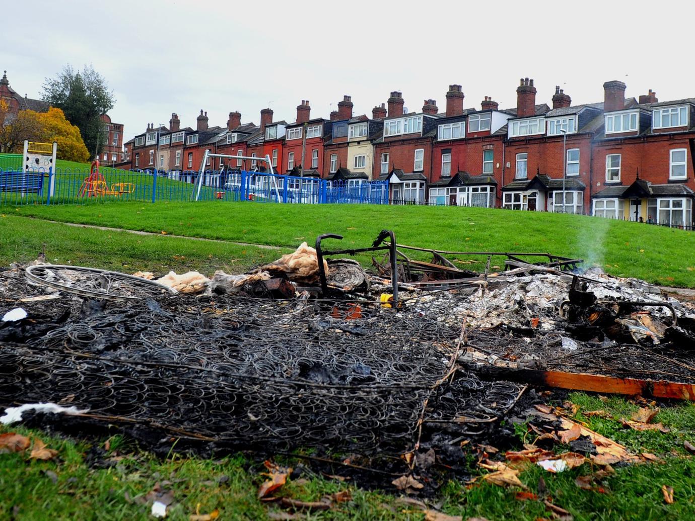 The remains of a bonfire in Banstead Park, the place police were first called to.