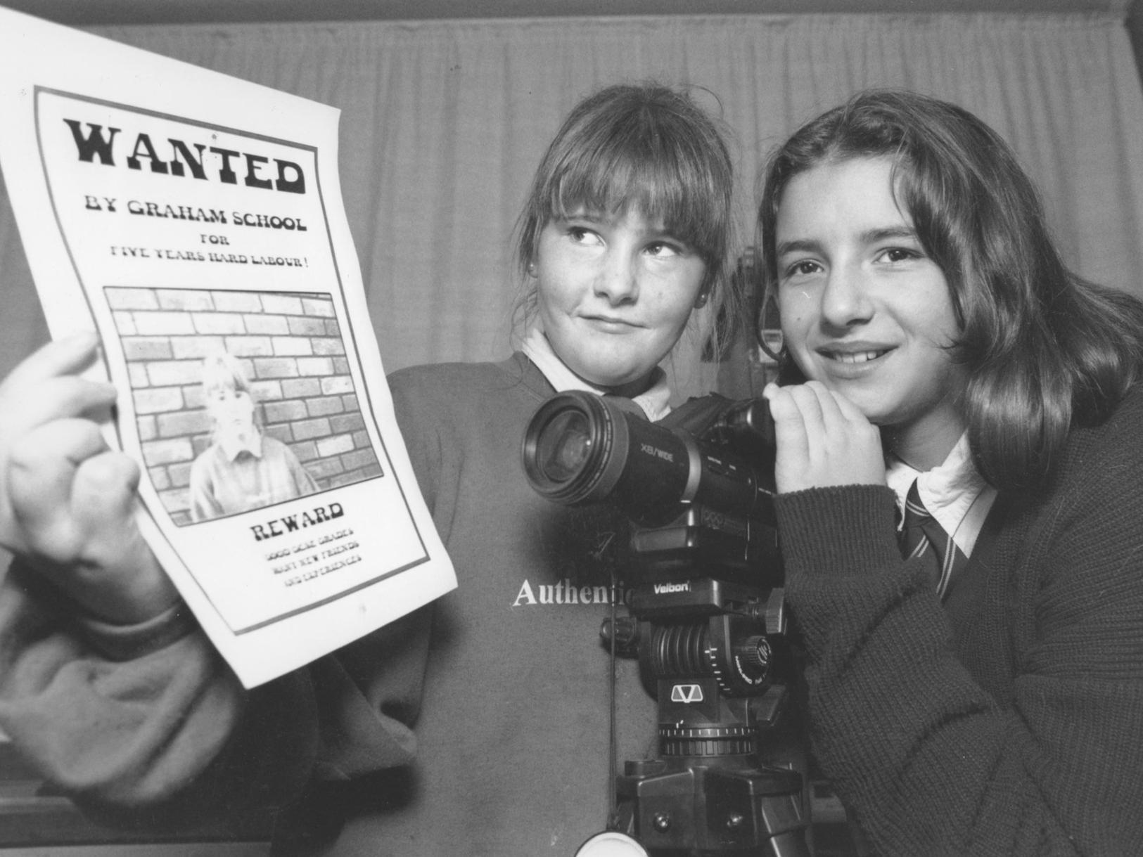 At a Graham School opening evening in November 1995 Felicity Power, left, found herself on a wanted poster with a little help from video camera operator Jessica Holmes.