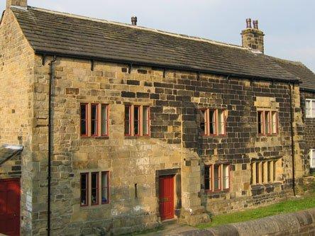 A medieval manor house with Grade I listed building status located in the village of Calverley in west Leeds.