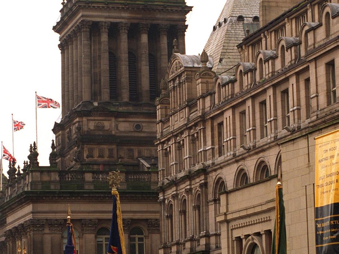 Silent remembrance on The Headrow as Leeds Town Hall strikes 11am.