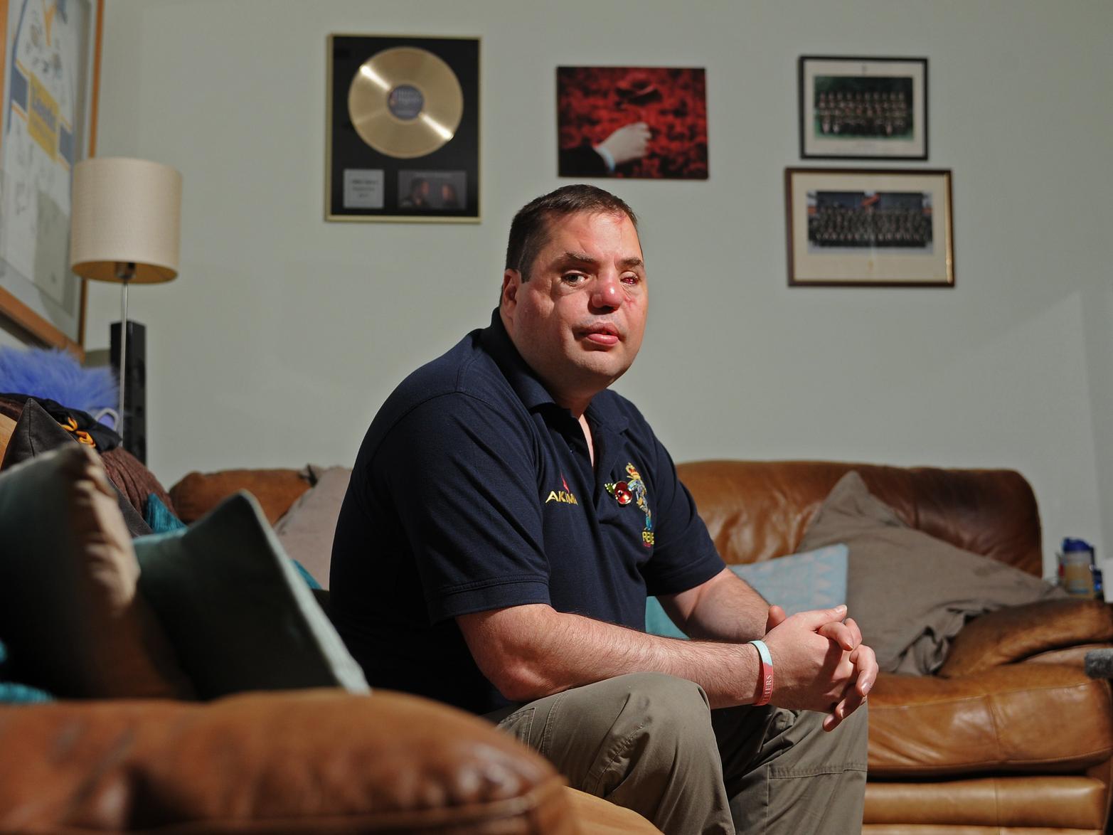 The poppy, says Leeds veteran Simon Brown, stands as a symbol of hope rather than one of war. Image: Tony Johnson.
