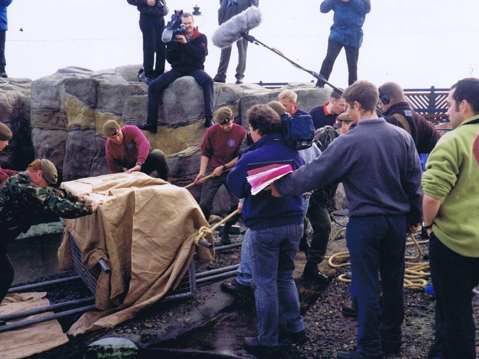 4th/5th Battalions, The Green Howards, surrounded by media, A Coy. rescuing Magnus the seal at the Sea Life Centre, Scarborough for Channel Four's 'Pet Rescue', December 1997