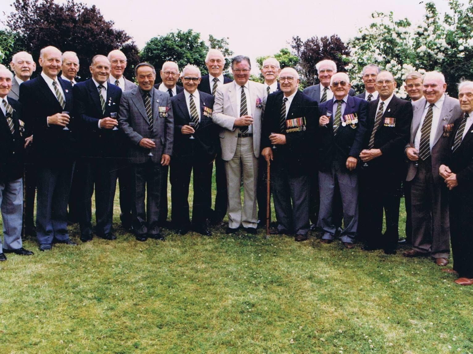 Group photograph, with the Regimental Secretary Colonel McIntosh (centre), Mark Major and other male supporters at Bridlington Sunday 14th July 1996