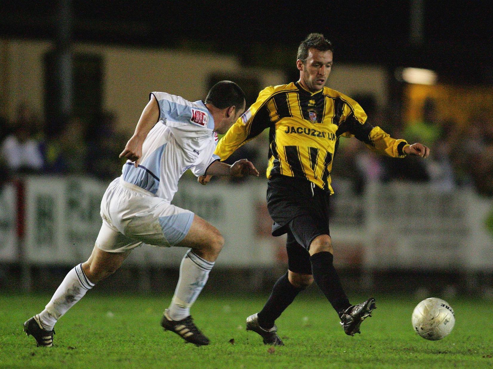 Roy Hunter on the ball for Town during their 0-0 replay draw with Torquay. The initial tie at Plainmoor had ended 1-1, Danny Holland the man on target for Town.