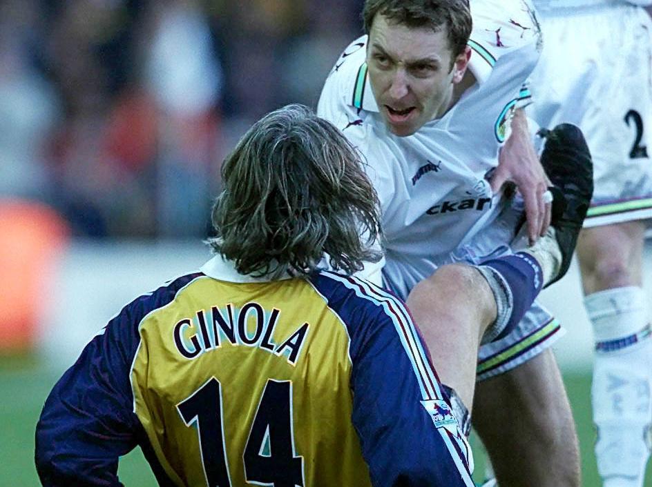 Jason Wilcox makes his feelings clear to Tottenham's David Ginola during their FA Carling Premiership clash at Elland Road.
