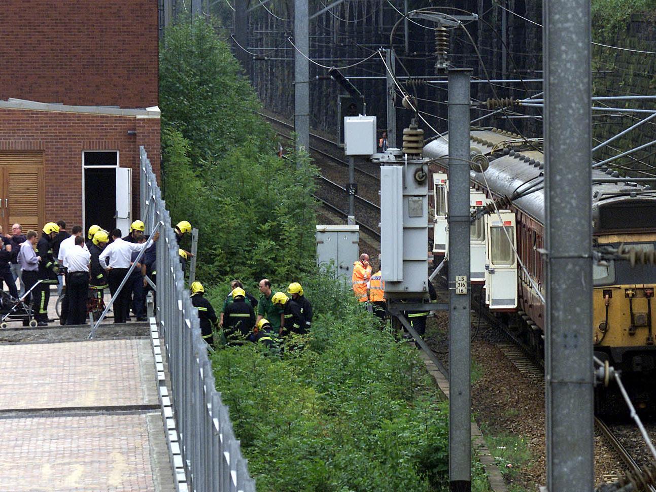 Passengers are evacuated from a train after the middle carriage of the passenger train caught fire at the old Armley railway station on Canal Road. Nobody was injured and around 50 passengers were evacuated.