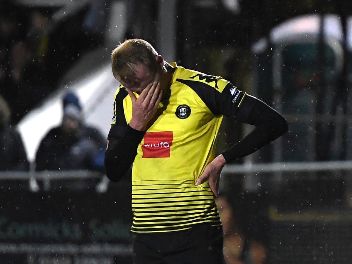 Mark Beck cuts a dejected figure following Harrogate Town's FA Cup loss to Portsmouth