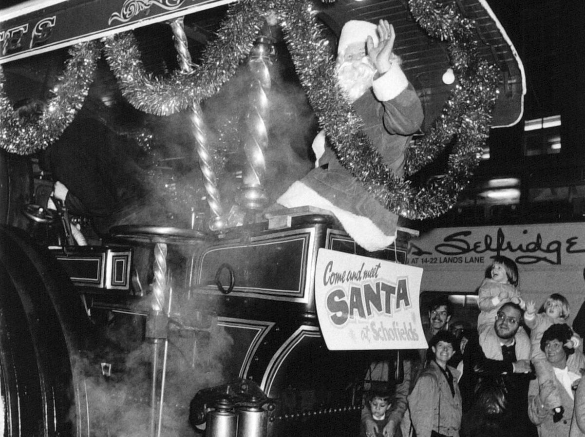 Father Christmas arrives at Schofields aboard a 1920 Fowler showman's engine.