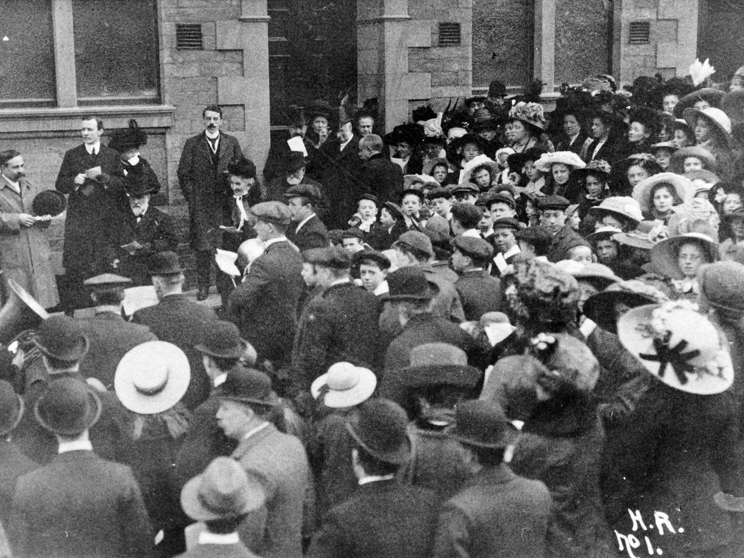 The opening of a new library on the upper floor of Rodley Baptist Sunday School in 1911. The flats of St. Andrew's Close stand there now.