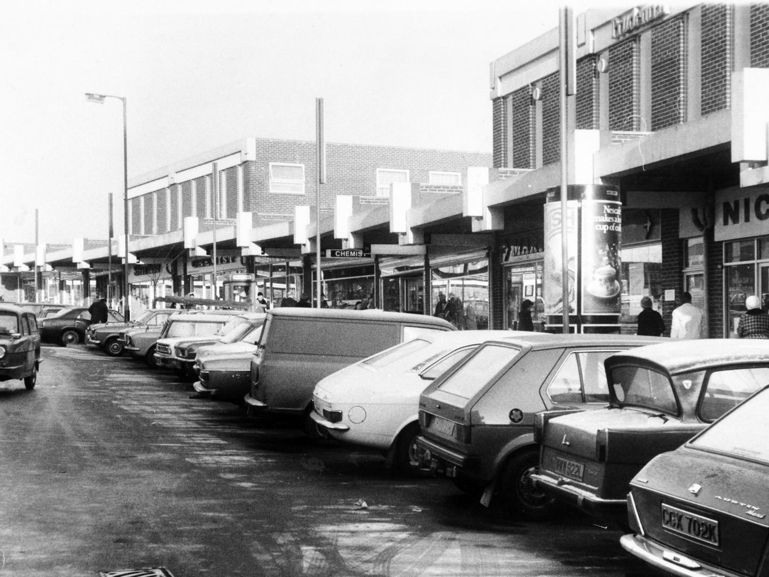 A full car park at Bramley Shopping Centre.
