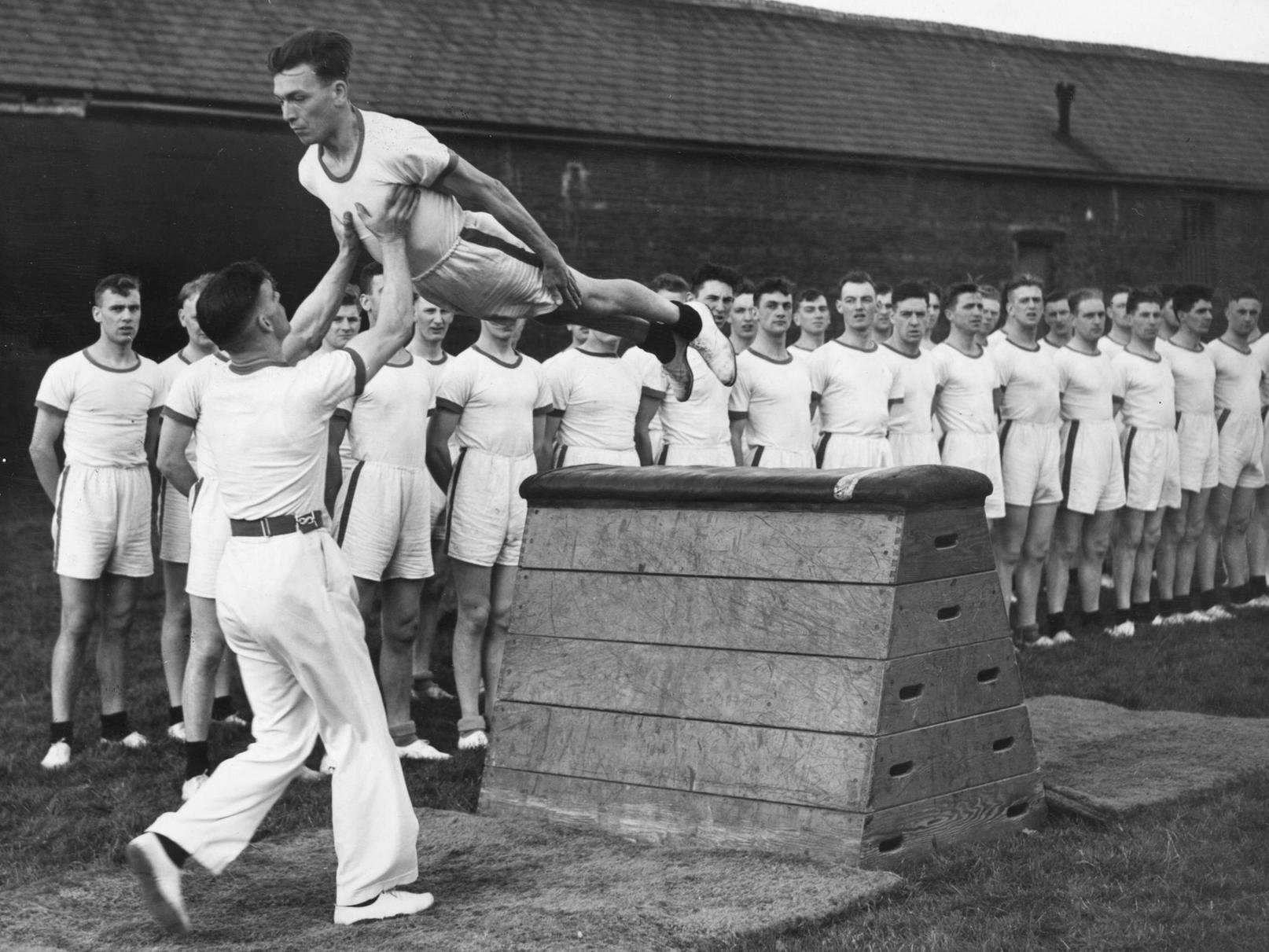Recruits to the police force during a physical training session in February 1939