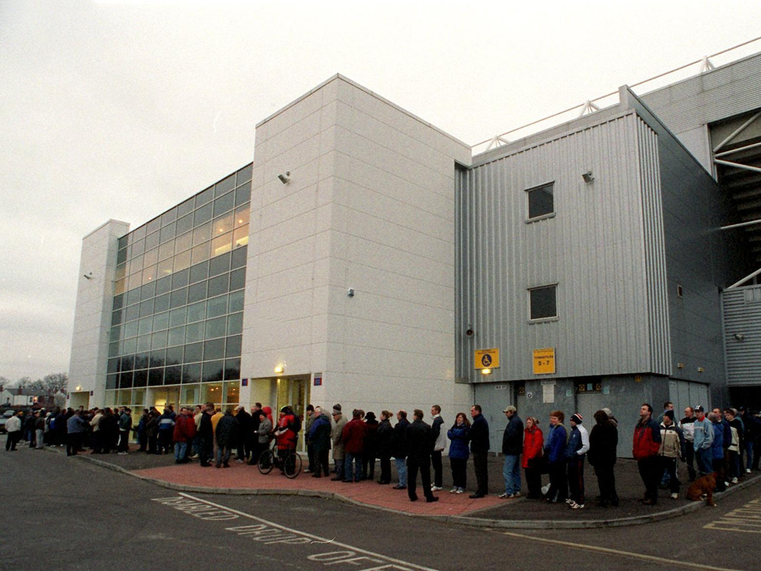 Preston fans queue for tickets for the FA Cup visit to Everton in 2000