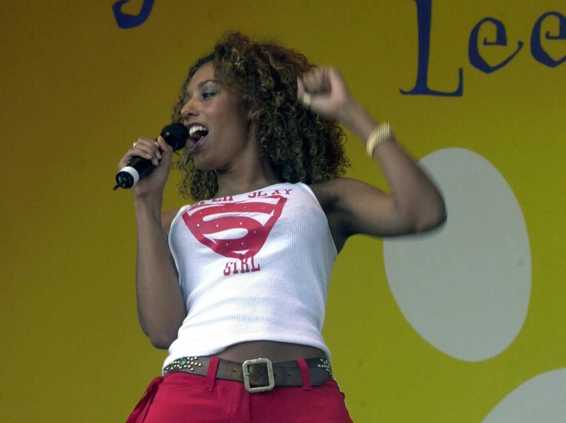 Mel B belts out a tune on stage at Party in the Park in front of 70,000 pop fans at Temple Newsam Park.