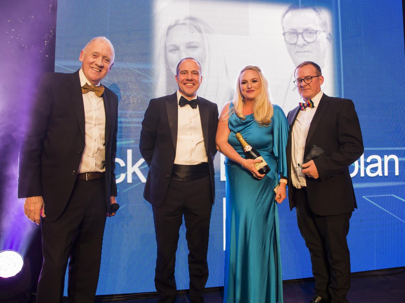 Entrepreneur of the Year. From the left, host Harry Gration, sponsor Chris Beaven from And Digital with winners Vicky and Brian Nolan.