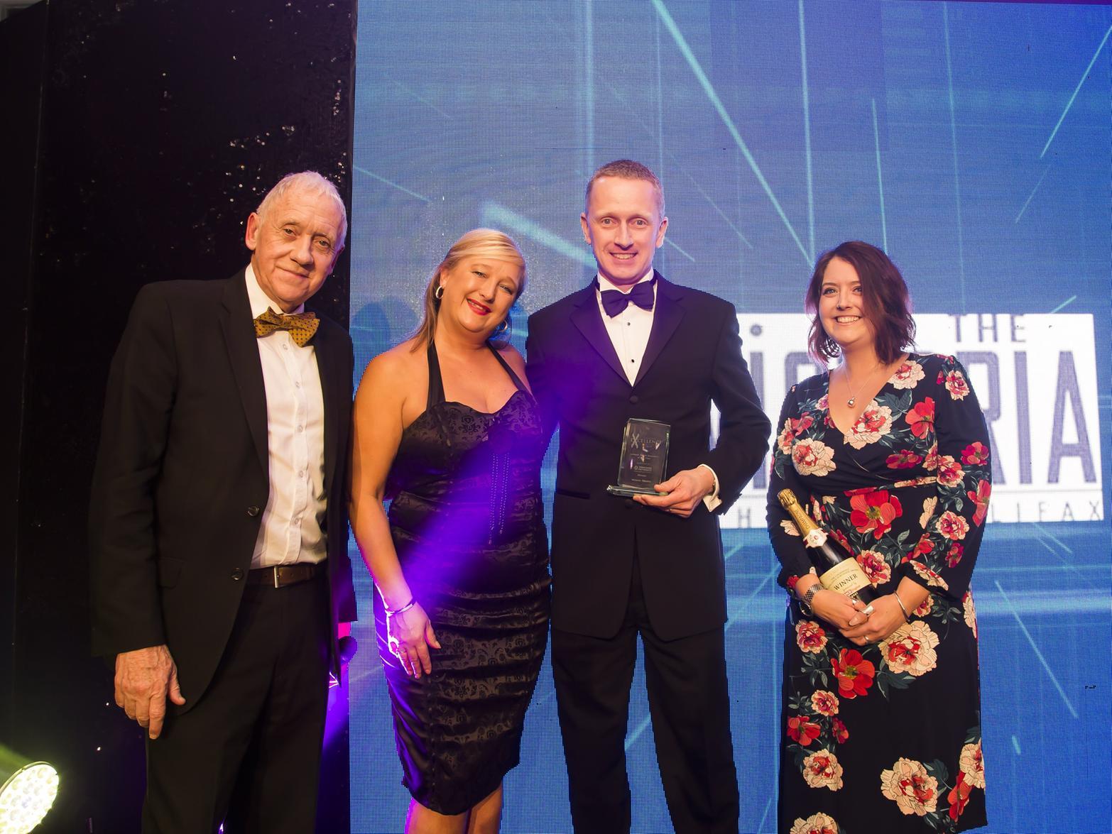 Leisure / Retail Business of the Year. From the left, host Harry Gration, sponsor Teresa Whyte from Yorkshire Payments and Robert Lofthouse and Chloe Oldman from winner Victoria Theatre.