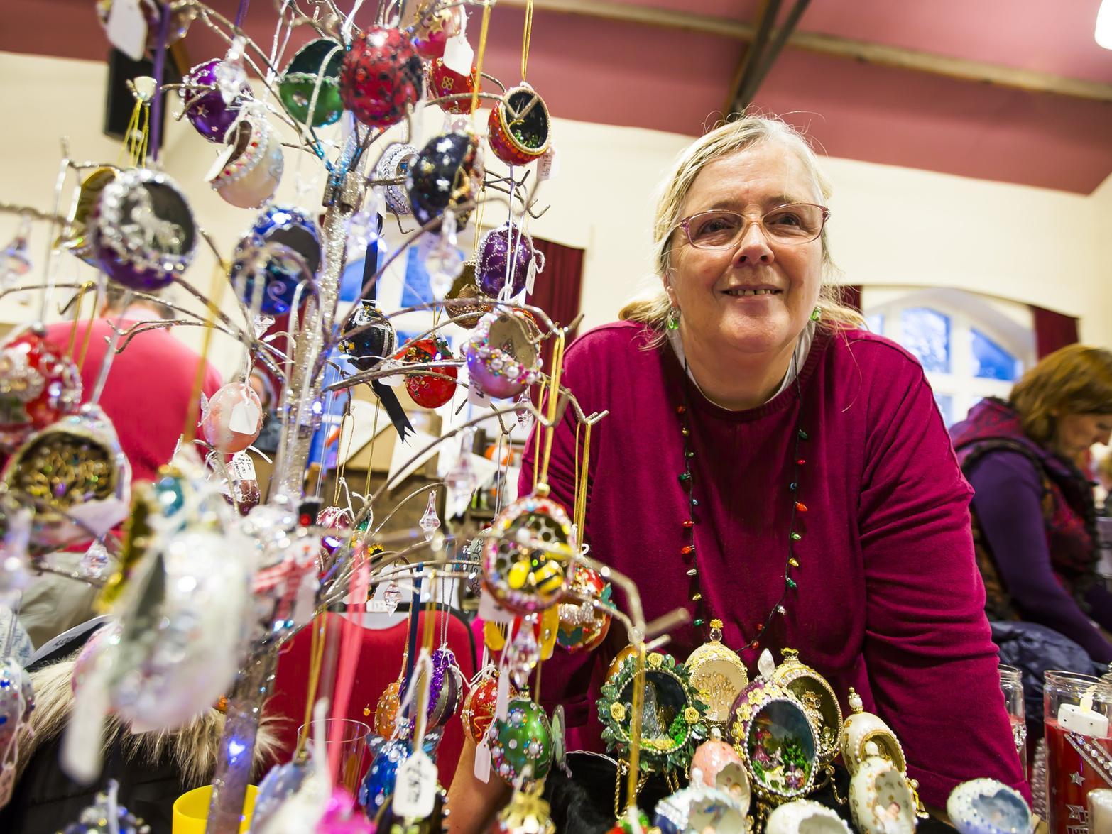 Melanie Rayner with her Keepsake Eggs and Candles stall at the festive market.