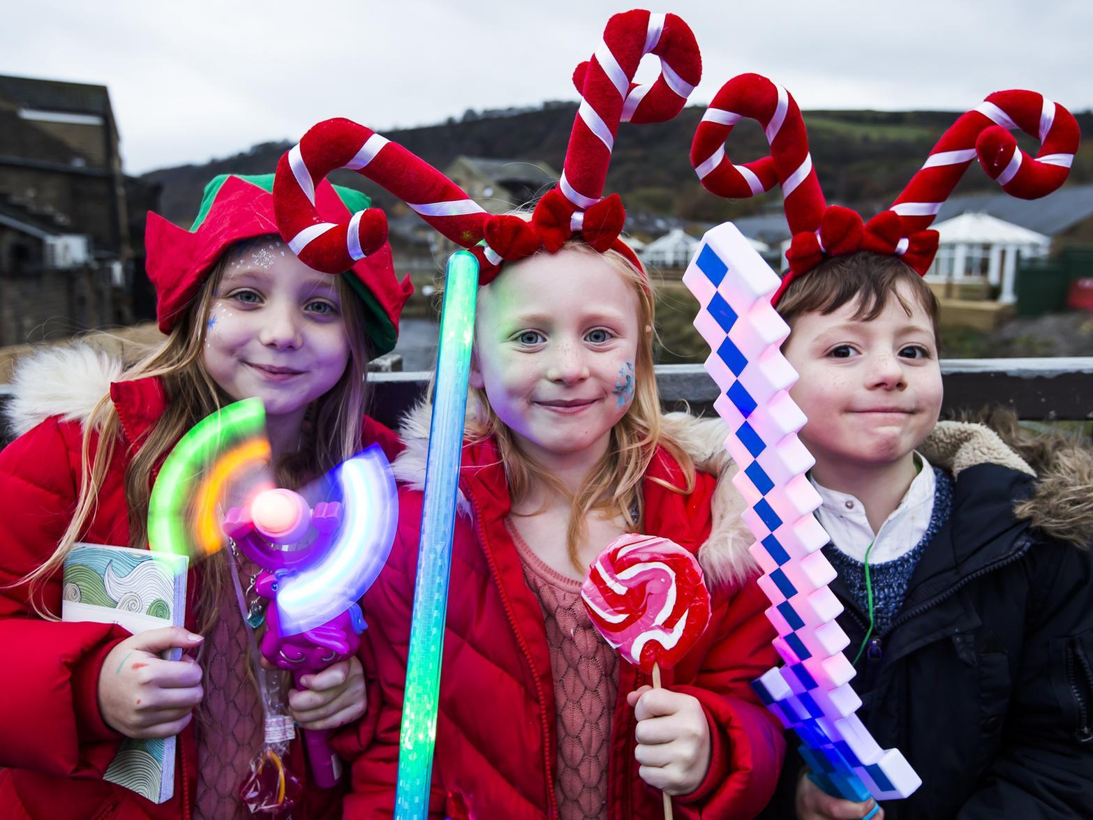 From the left, Lily Russell, eight, Poppy Russell, seven, and Jack Bowker-Hoyle, six got into the Christmas spirit in Mytholmroyd.