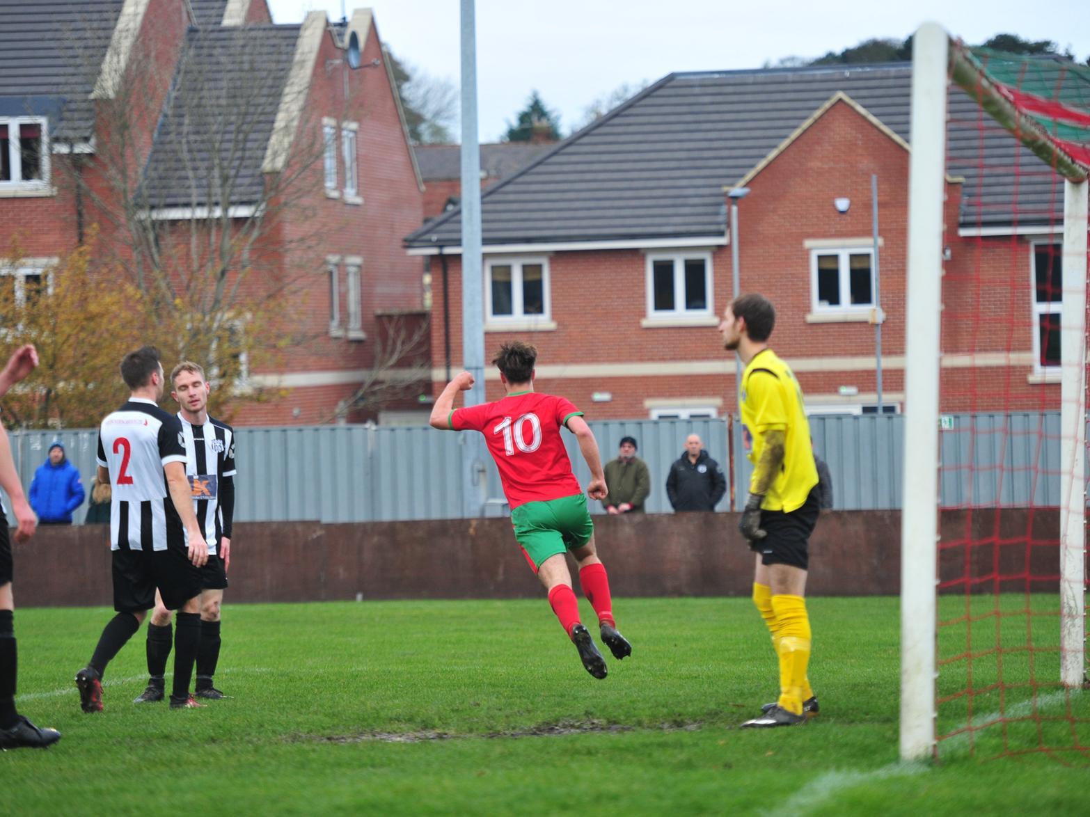Paddy Sykes wheels away in celebration after heading Harrogate Railway into an early lead against Brigg Town.