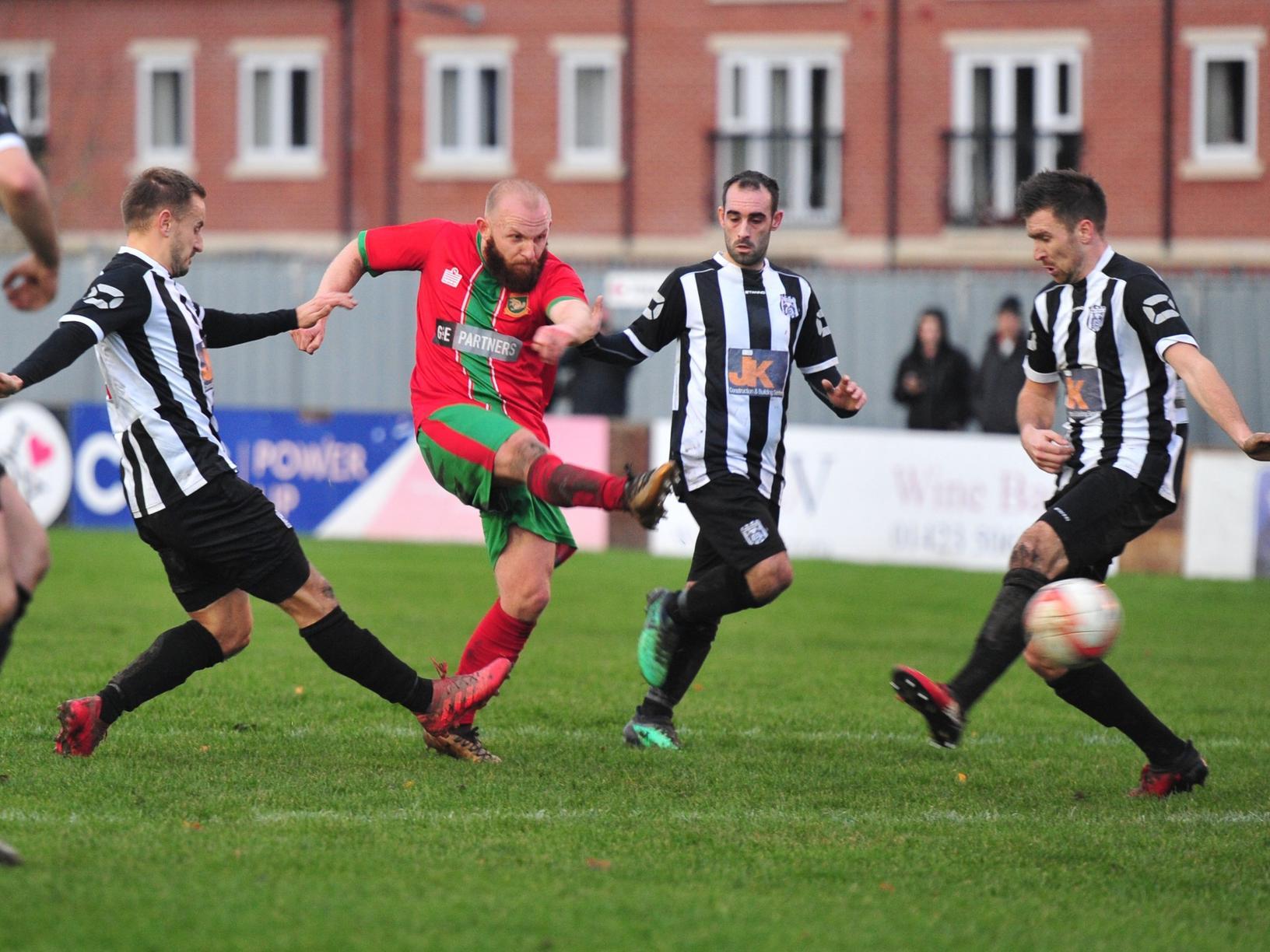 Josh Shields shoots at goal during Harrogate Railway's NCEL Division One clash with Brigg Town.