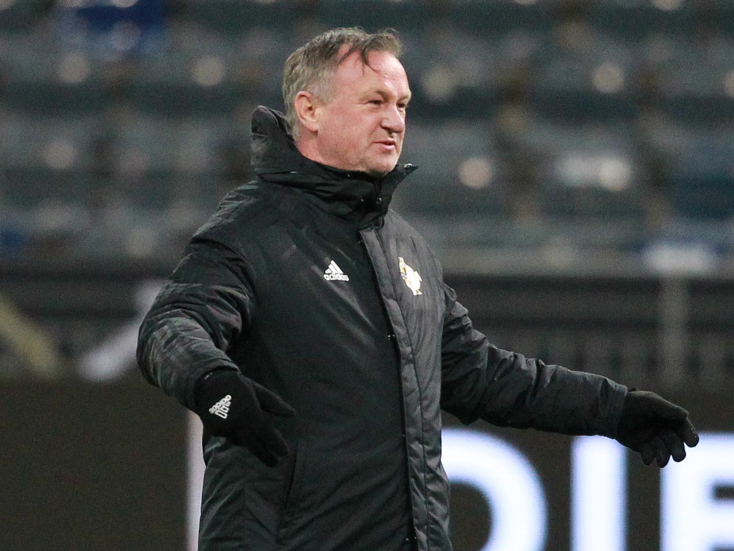 Northern Ireland manager Michael O'Neill has played down concerns that he could struggle managing both Stoke City and a national team, branding the task as "dead easy" (BBC Football)