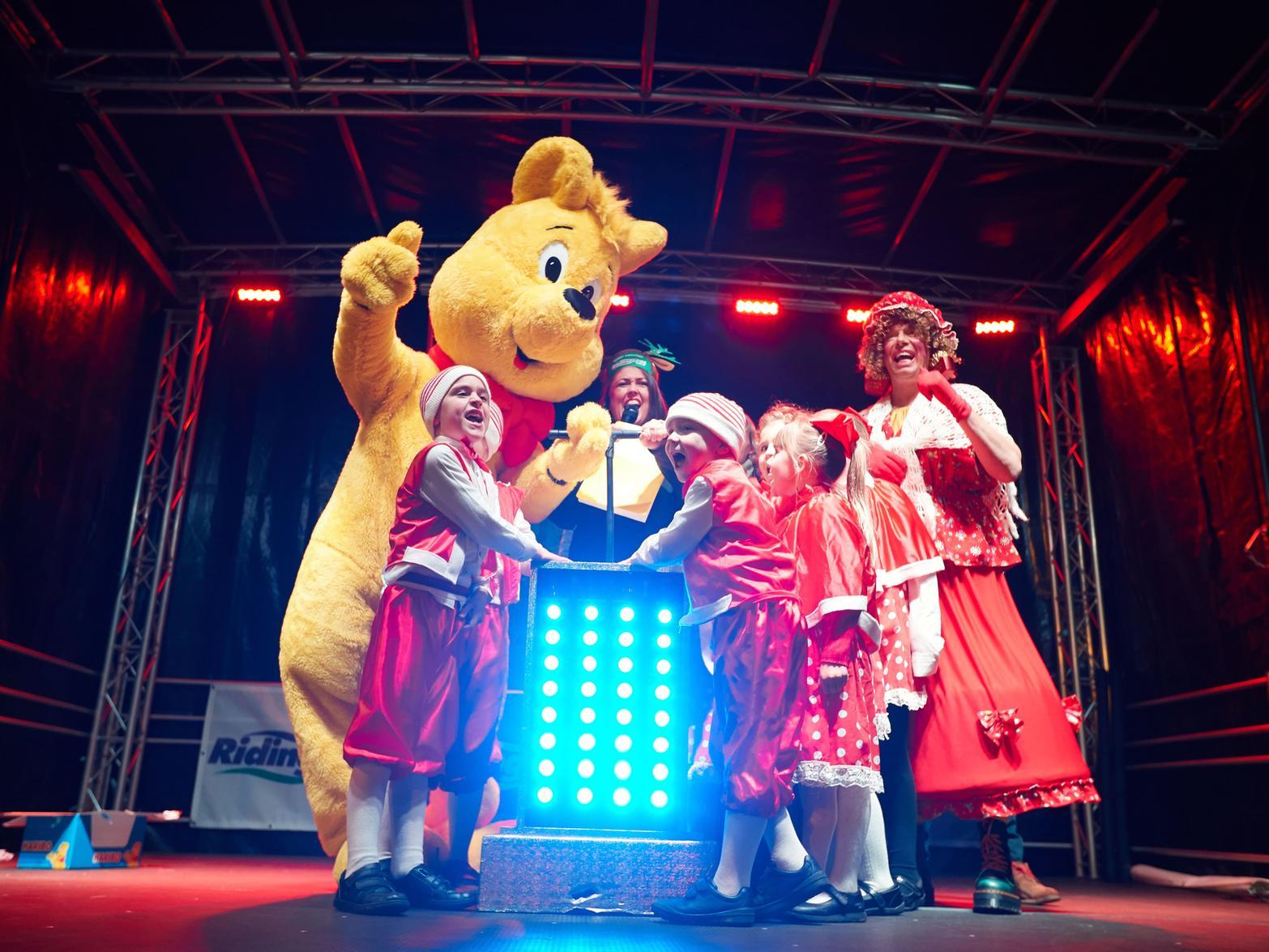 The Harribo Bear was joined by Holly and the Sunbeams on stage to switch on the lights.