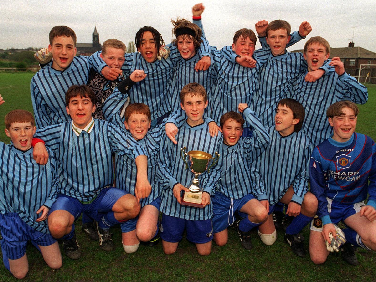Winners of the YEP U-14s schools cup, Mount St Marys, with the trophy after beating Boston Spa in the final.