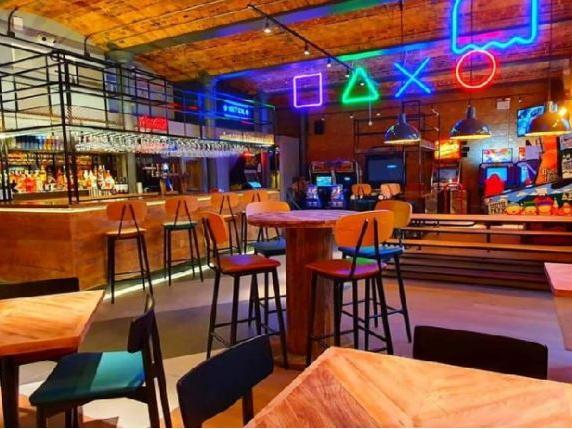 Although its only been open a few weeks, the Next Level Bar in Dean Clough has already made an impression with locals. Alongside food and drinks sit retro arcade game machines.