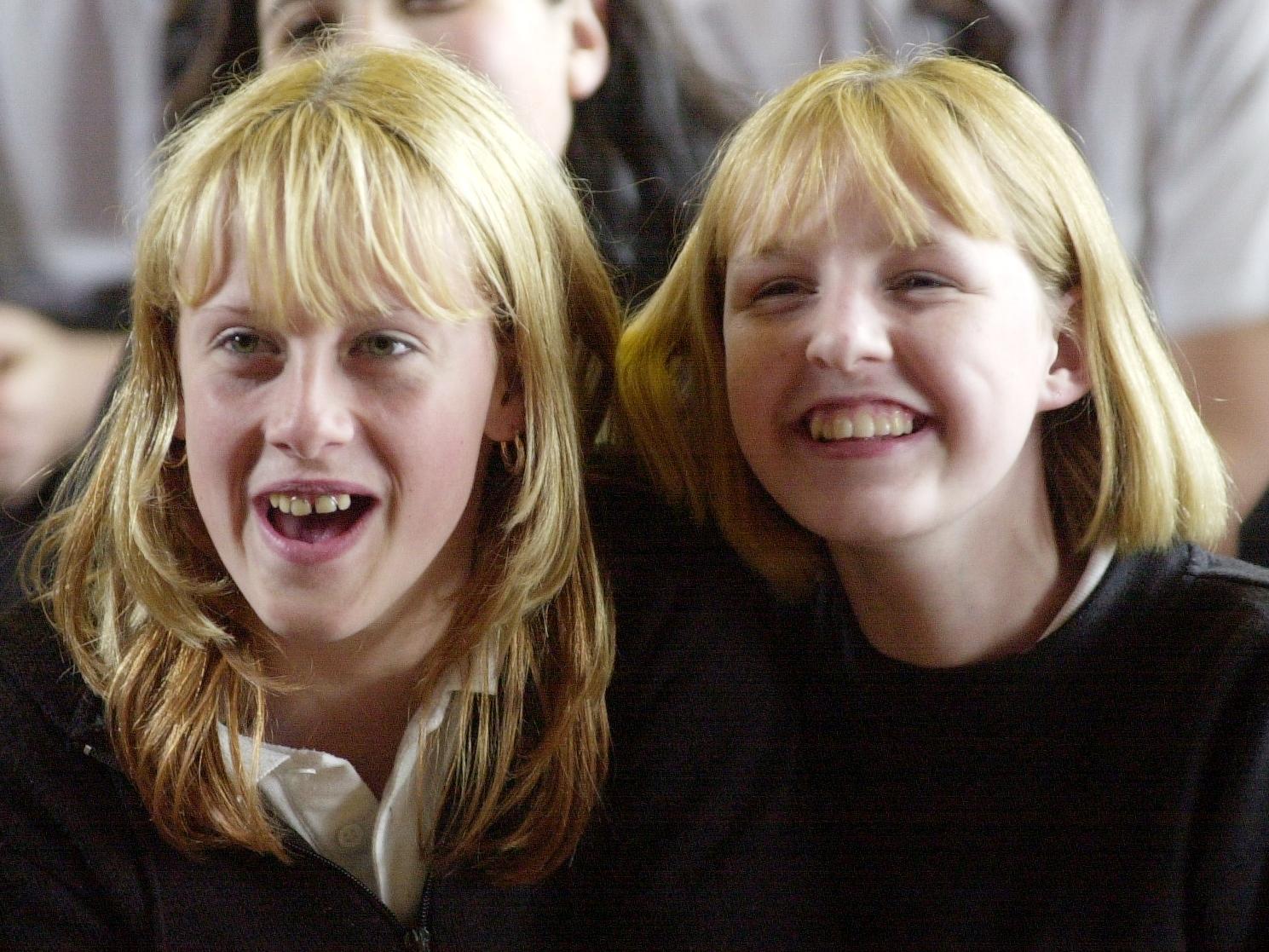 And these pupils - Kylie Philbin (left) and Zoe Dobson - found the head shave highly amusing.